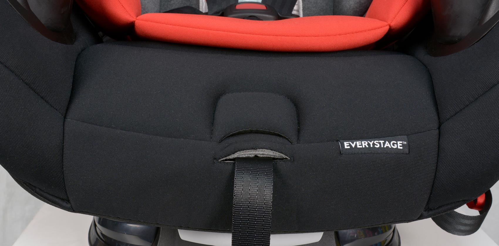 Evenflo EveryStage DLX лямка натяжения ремней 