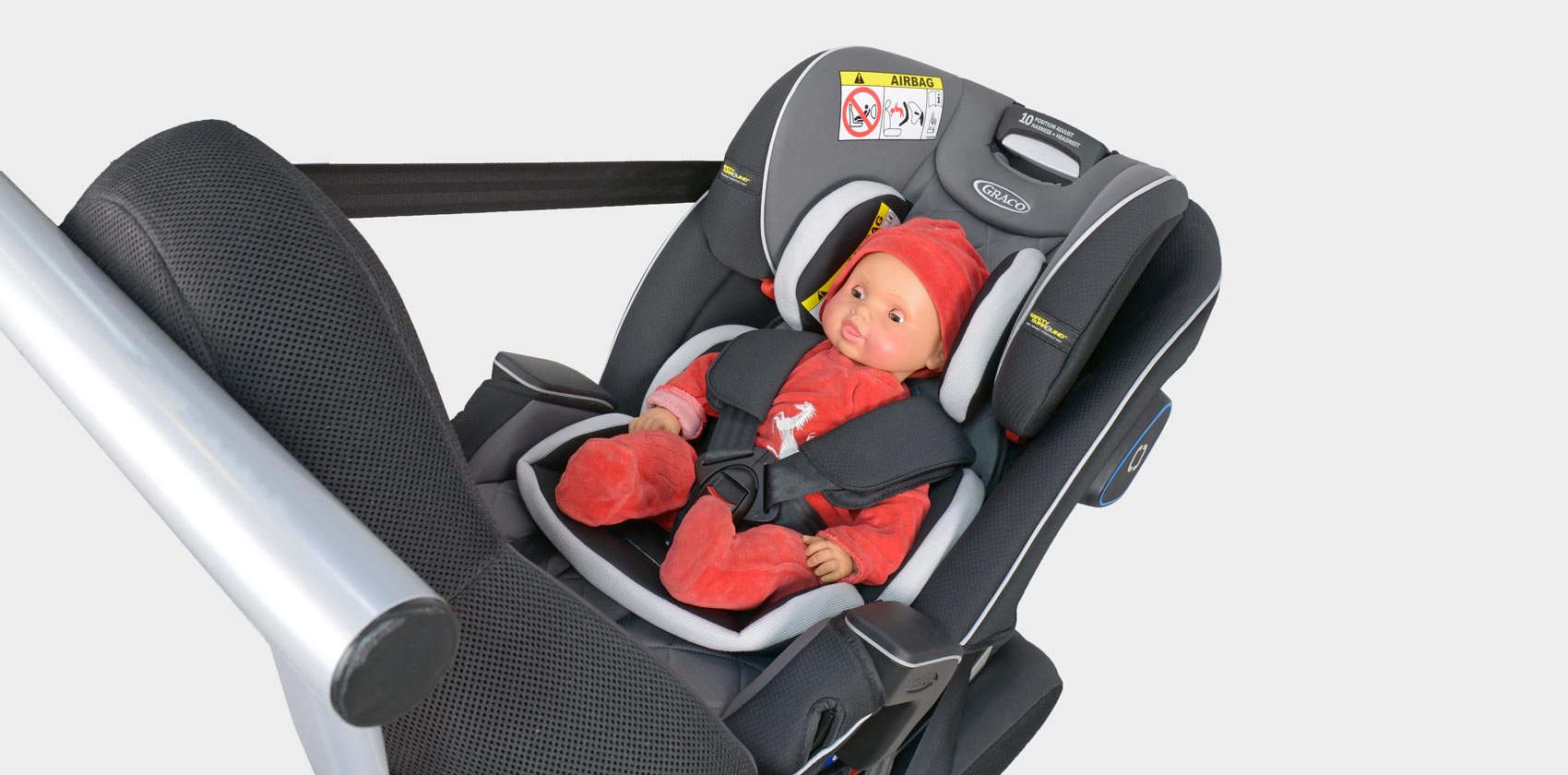 Graco SlimFit LX фиксация ребёнка против хода